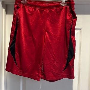 Red and black Nike basketball shorts